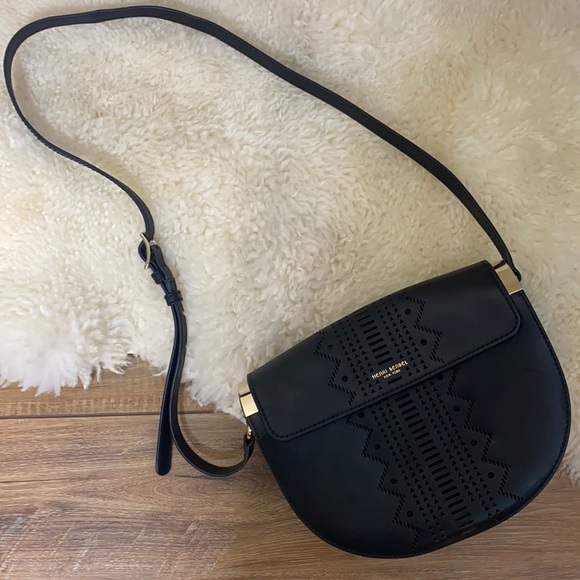 Henri Bendel Perforated Half Circle Bag
